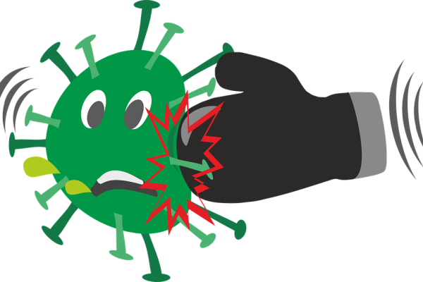 Coronavirus being punched by a boxing glove